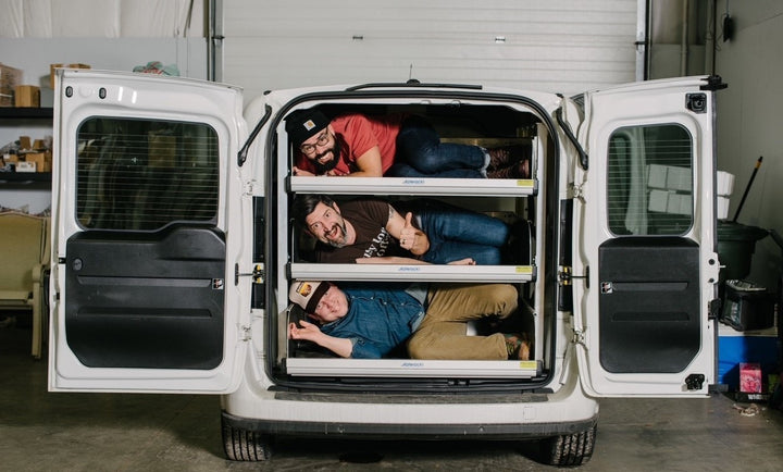 Rusty Dog Coffee delivery van with owners Manny, Tom and Tony inside